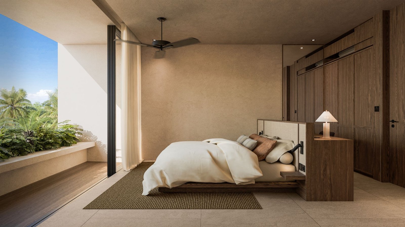 Bedroom opening onto a balcony with sea view