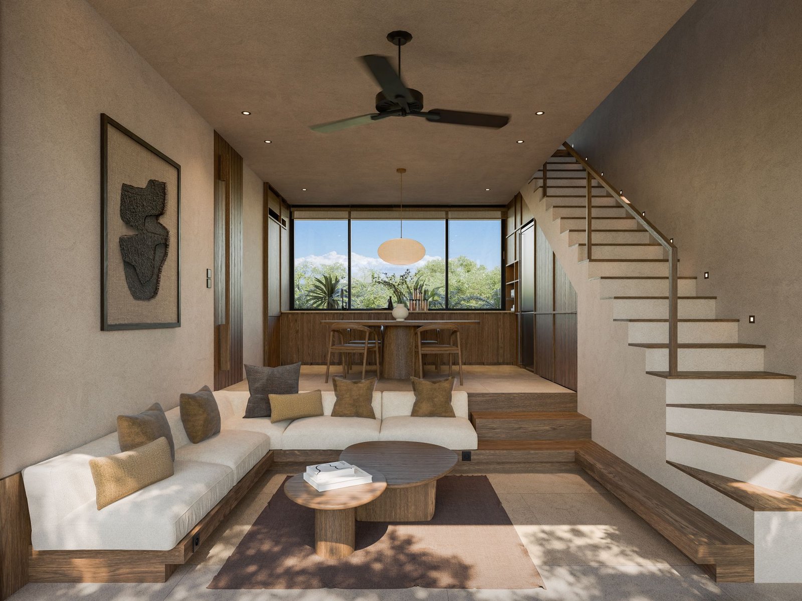 Living and dining area with kitchen and staircase
